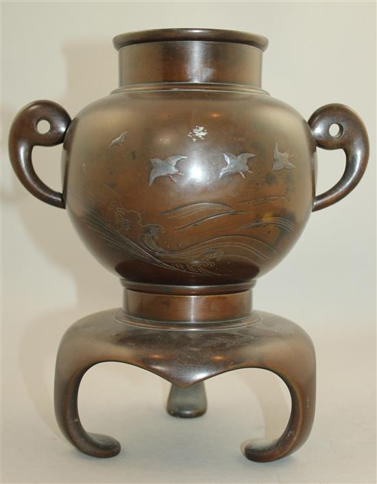 A Japanese inlaid bronze two handled vase and stand, Meiji period, 26cm